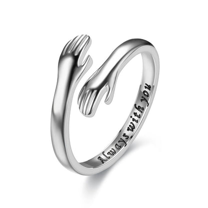 Der Ring, der eine liebevolle Umarmung symbolisiert