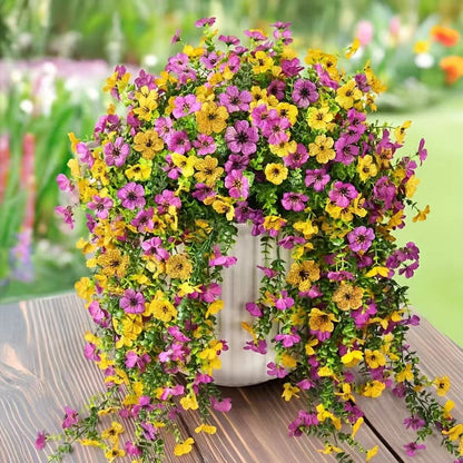 Kaskadenförmig angeordnete Gänseblümchen und Eukalyptusblüten für den Außenbereich – UV-beständig