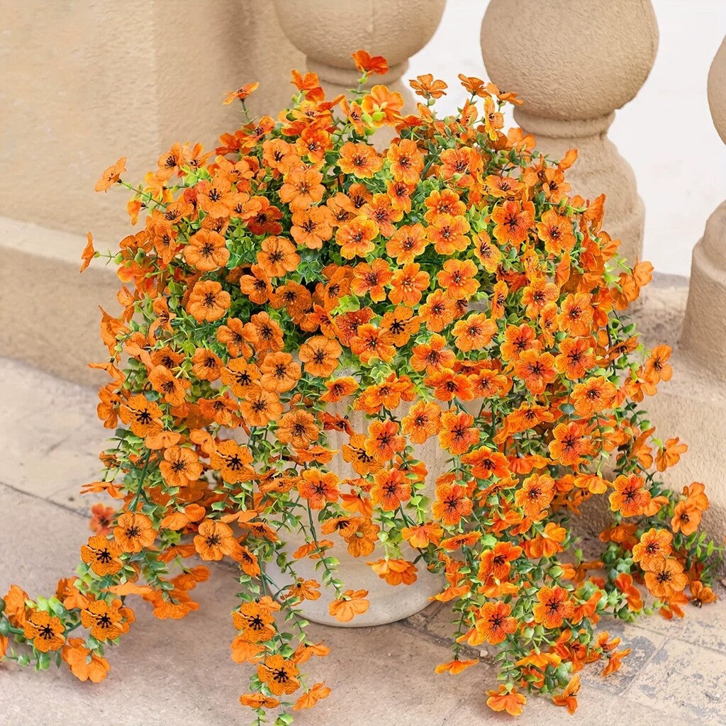 Kaskadenförmig angeordnete Gänseblümchen und Eukalyptusblüten für den Außenbereich – UV-beständig
